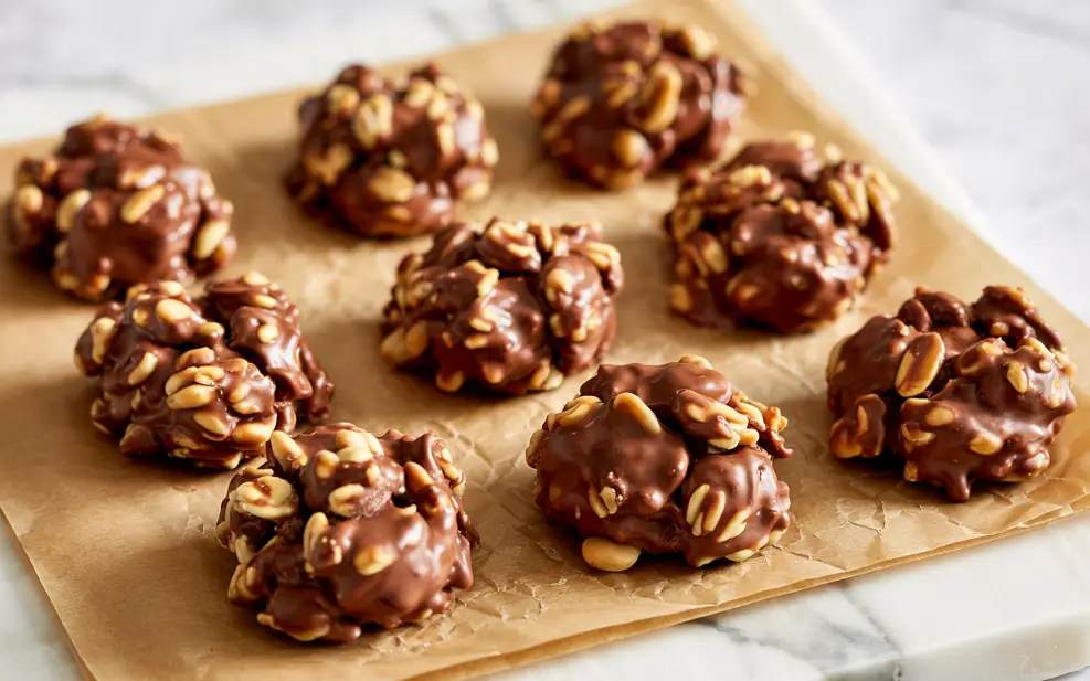 No-Bake chocolate peanut butter cookies setting on parchment